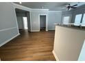 Spacious living room featuring hardwood floors and neutral paint tones at 1411 Telfair Way, Charleston, SC 29412