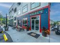 Attractive building featuring ample outdoor seating, creating a vibrant and inviting atmosphere for visitors at 2007 E Patterson Pt, Hanahan, SC 29410