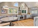 Modern kitchen boasting stainless steel appliances, ample counter space, and a cozy breakfast nook at 2202 Oyster Catcher Ct, Seabrook Island, SC 29455