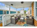 Cozy porch furnished with comfortable seating and a view of the neighborhood at 234 Rutledge Ave # C, Charleston, SC 29403