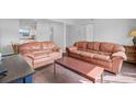 Bright living room with two sofas and hardwood floors at 2362 Parsonage Rd # 2G, Charleston, SC 29414