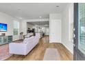 Bright and airy living room with modern finishes and an open floor plan at 326 Ripple Park Dr, Summerville, SC 29486