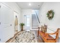 Foyer with hardwood floors and a staircase leading to the upper level at 532 Fern Tree Dr, Summerville, SC 29486