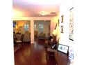The living room has beautiful hardwood floors and a comfortable and inviting feel at 8592 Sentry Cir, North Charleston, SC 29420
