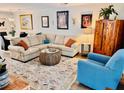 Comfortable living room features a sectional sofa, stylish rug, and tasteful decor for a cozy ambiance at 927 Dills Bluff Rd # 33, Charleston, SC 29412