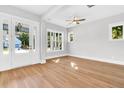 Bright and airy living room with beautiful hardwood floors, recessed lighting, and multiple windows at 2210 Norwood Oaks Dr, Mount Pleasant, SC 29466