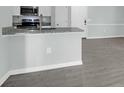 Kitchen area featuring granite countertops and white cabinets at 2212 Telfair Way, Charleston, SC 29412