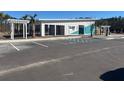Hillcrest community clubhouse with blue accents and a parking area in front at 2299 Macallan Blvd, Ravenel, SC 29470