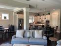 Open concept living room and kitchen area with stainless steel appliances at 3668 Maidstone Dr, Mount Pleasant, SC 29466