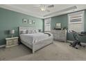 Serene main bedroom featuring tray ceilings, ample natural light, and a neutral color palette at 4237 William E Murray Blvd, Charleston, SC 29414