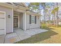 Close-up of the front entrance, showcasing the door, landscaping, and welcoming details at 94 Dean Dr, Summerville, SC 29483