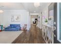 Inviting foyer showcasing hardwood floors, elegant lighting, and an open layout at 1261 Gannett Rd, Mount Pleasant, SC 29464