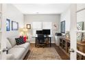 Bright office space with a comfortable sofa, desk setup, and stylish decor perfect for working from home at 1403 Thin Pine Dr, Johns Island, SC 29455