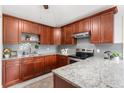 Well-equipped kitchen features granite countertops and stainless steel appliances at 422 Jean Wells Dr, Goose Creek, SC 29445
