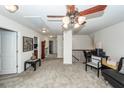 Bright upstairs hallway features a study area, multiple doors, and ceiling fan with lighting at 613 Zinnia Dr, Goose Creek, SC 29445