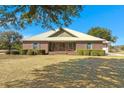 Beautiful brick home with a welcoming front porch and well-manicured landscaping creates a stunning curb appeal at 732 Lindhaven Dr, Pineville, SC 29468