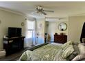 Inviting main bedroom with ample natural light and an ensuite bathroom at 8072 Bing Hill Road Rd, Adams Run, SC 29426