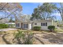Cozy single-story home with a spacious front yard and traditional curb appeal at 834 Prince John Dr, Charleston, SC 29407