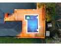 Aerial view of a home featuring a spacious wooden deck and pool at 1235 Sunset Dr, Charleston, SC 29407