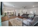 Open concept living room and kitchen with hardwood floors, recessed lighting, and plenty of natural light at 133 Caleb Ct, Ladson, SC 29456