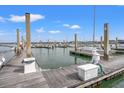 Picturesque marina featuring boat slips and clear blue skies on a sunny day, great for yachting enthusiasts at 2 Mcdonough Rd # C-1, Folly Beach, SC 29439