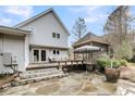 The backyard offers a patio and screened outdoor space, ideal for relaxation and entertaining at 2224 Shoreline Dr, Johns Island, SC 29455