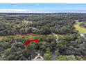Panoramic aerial showcasing the property's location near the ocean and golf course at 2515 Cat Tail Pond Rd, Seabrook Island, SC 29455