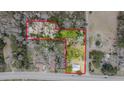 Aerial view outlining property boundaries, showcasing land with mature trees and proximity to local roads at 2604 Highway 78, Dorchester, SC 29437