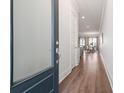Bright entryway with beautiful hardwood floors and white trim, leading to an open floor plan at 2901 Eddy Dr, Mount Pleasant, SC 29466