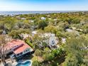 Beautiful coastal home with a pool, jacuzzi and scenic ocean views in a lush green neighborhood at 3 Cross Ln, Isle of Palms, SC 29451