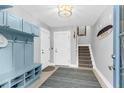 Inviting foyer featuring a charming mudroom and a staircase at 3034 Bell Cv Aly, Johns Island, SC 29455