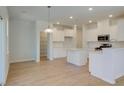 Bright kitchen with white cabinets, stainless steel appliances, and spacious pantry at 513 Verdi Dr, Summerville, SC 29486