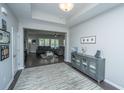 Comfortable living room with an open floor plan, hardwood floors, and neutral paint at 718 Kilarney Rd, Summerville, SC 29483