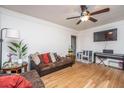 Inviting living room with hardwood floors, a ceiling fan, and a neutral color palette at 2671 Houston St, North Charleston, SC 29405