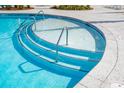 Inviting swimming pool with unique steps for easy and comfortable access to the water at 591 Red Monarch Way, Moncks Corner, SC 29461