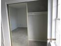 Spacious bedroom closet with mirrored doors and ample storage space at 7851 Sandida Ct, North Charleston, SC 29418