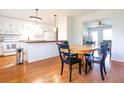 Eat-in kitchen with a breakfast bar and view into the living room at 117 Loblolly Ln, Summerville, SC 29483