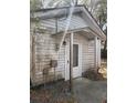 Rear exterior of a house with a door and utilities at 1907 Helm Ave, North Charleston, SC 29405