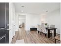 Inviting dining room with hardwood floors and an open layout to other living spaces at 284 Shadybrook Dr, Summerville, SC 29486