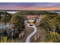 Beautiful aerial view of a stately home with a long winding driveway at 4051 Colonel Vanderhorst Cir, Mount Pleasant, SC 29466