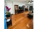 Inviting living room boasting gleaming hardwood floors and stylish decor at 4957 Trump St, North Charleston, SC 29420
