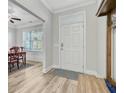 Bright foyer featuring hardwood floors, neutral walls, and ample natural light at 5415 Clairmont Ln, North Charleston, SC 29420