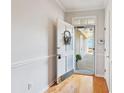 Bright foyer with hardwood floors, a decorative wreath, and plenty of natural light at 9021 Delancey Cir, North Charleston, SC 29406