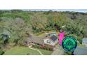 This aerial view shows the main house with the additional dwelling that is perfect as a guest house at 958 Mikell Dr, Charleston, SC 29412