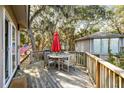 Inviting deck with outdoor seating, perfect for enjoying nature views at 12 Dune Crest Trace Trl, Seabrook Island, SC 29455