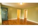 Bright living room with hardwood floors, neutral walls, and ample natural light at 424 Salley Ackerman Dr, Cottageville, SC 29435