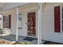 Close up of the home's front door, highlighting its clean design and inviting entry at 507 Tayrn Dr, Charleston, SC 29492