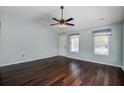 Bright living room with hardwood floors and plenty of natural light streaming through multiple windows at 507 Tayrn Dr, Charleston, SC 29492
