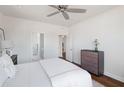 Bright bedroom with fresh white walls and dark hardwood floors, creating a serene and inviting space at 714 Minton Rd, Charleston, SC 29412