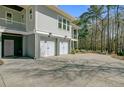 Spacious three-car garage with ample parking space and easy access to backyard at 1014 Bradbury Ln, Charleston, SC 29492